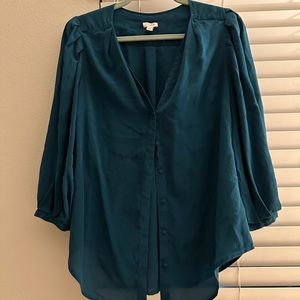 Teal silk button up with vintage look.
